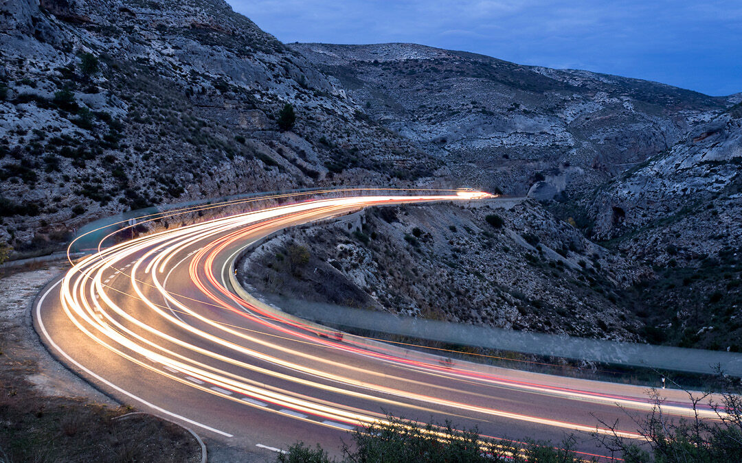 road with car lights at night